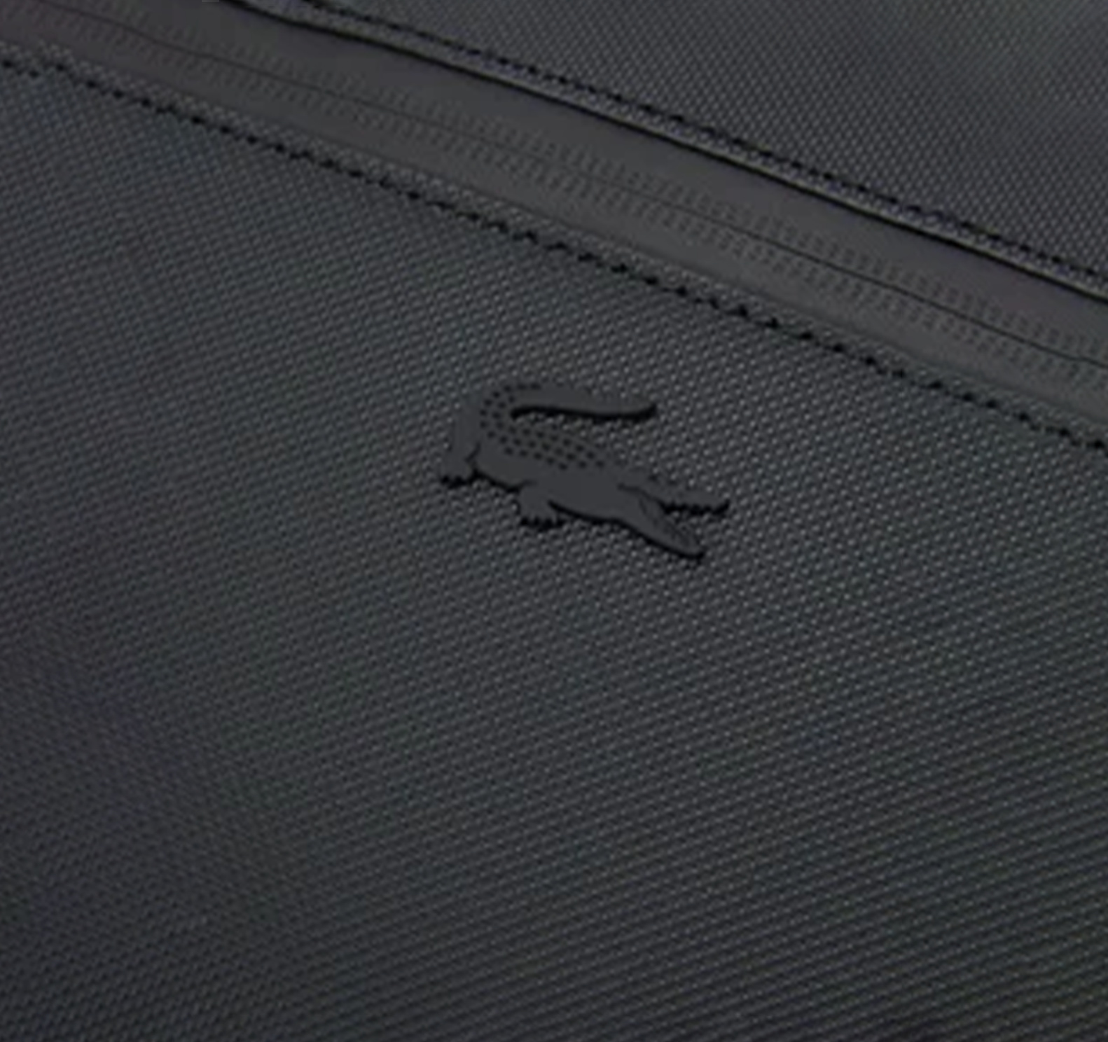 LACOSTE SACOCHE NAOS PRÈS DU CORPS EN PETIT PIQUÉ
