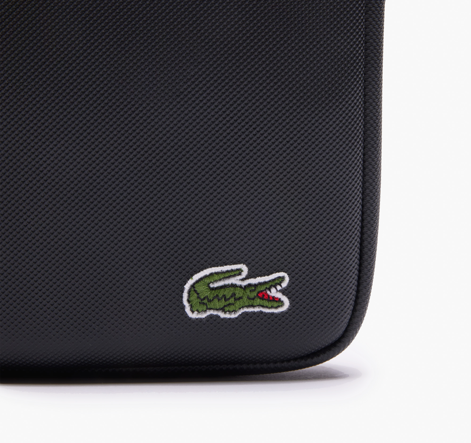 LACOSTE Sacoche Medium zippée LCST croisée en petit piqué