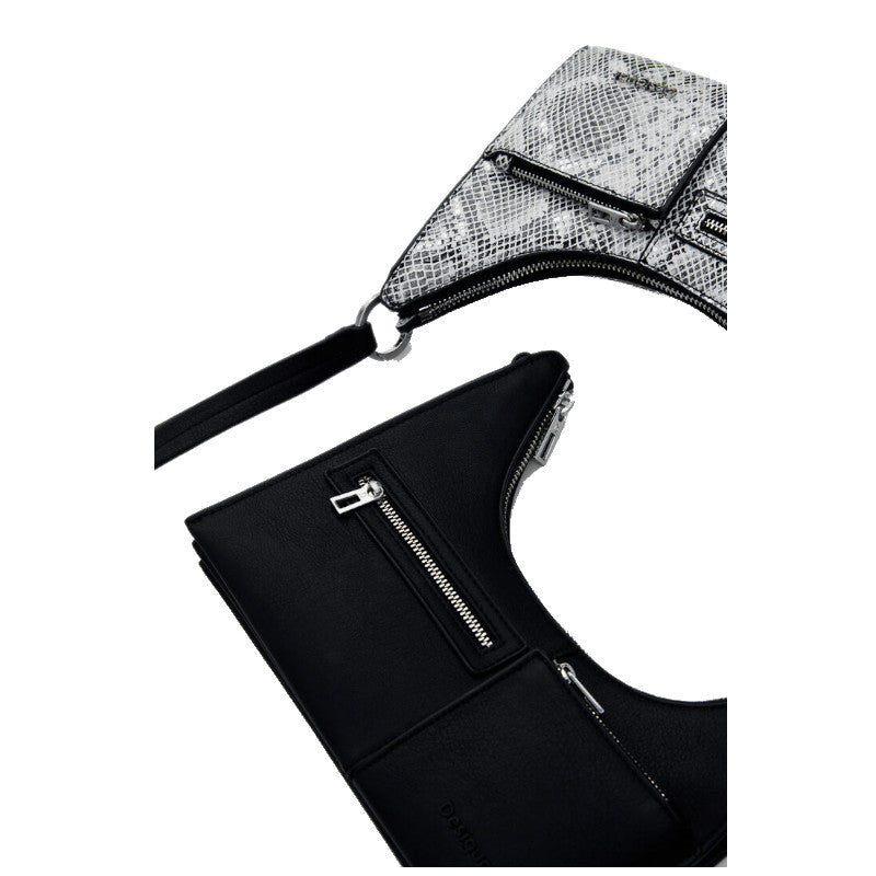 
                      
                        DESIGUAL Petit sac à bandoulière bicolore amovible
                      
                    