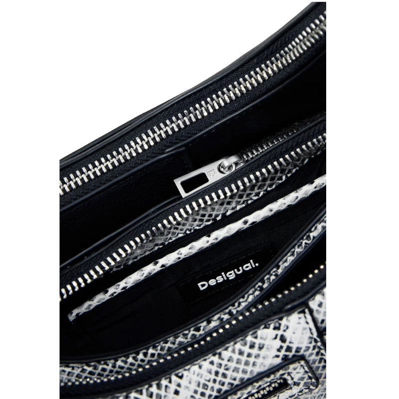 
                      
                        DESIGUAL Petit sac à bandoulière bicolore amovible
                      
                    