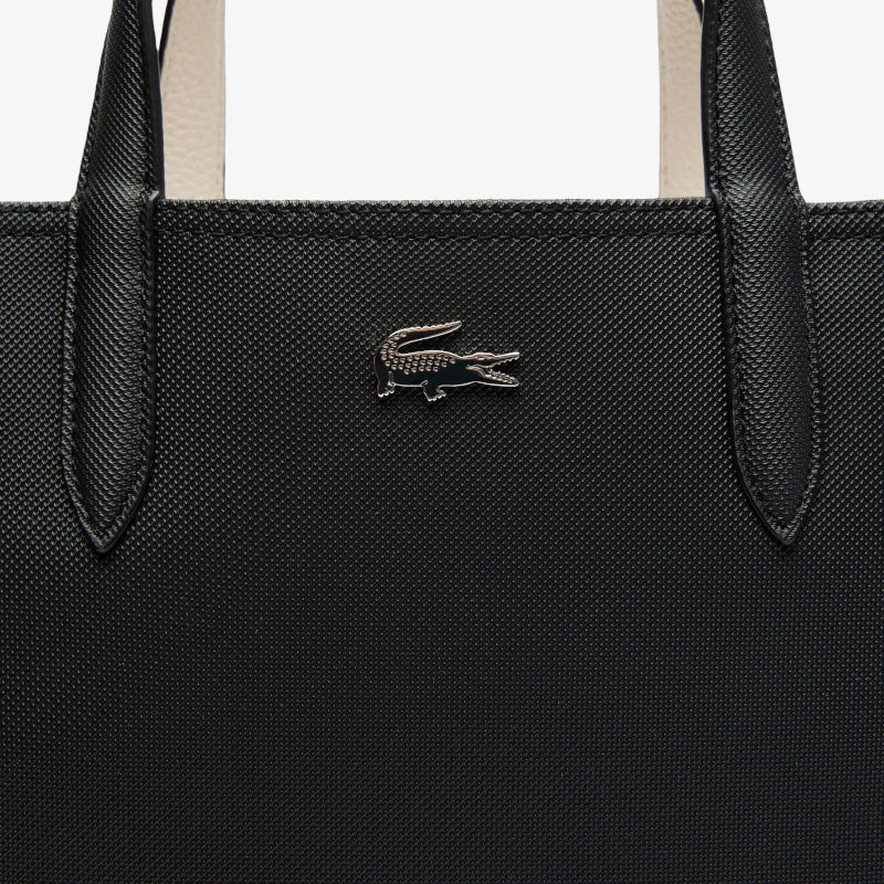 
                      
                        LACOSTE Sac cabas vertical Anna réversible
                      
                    