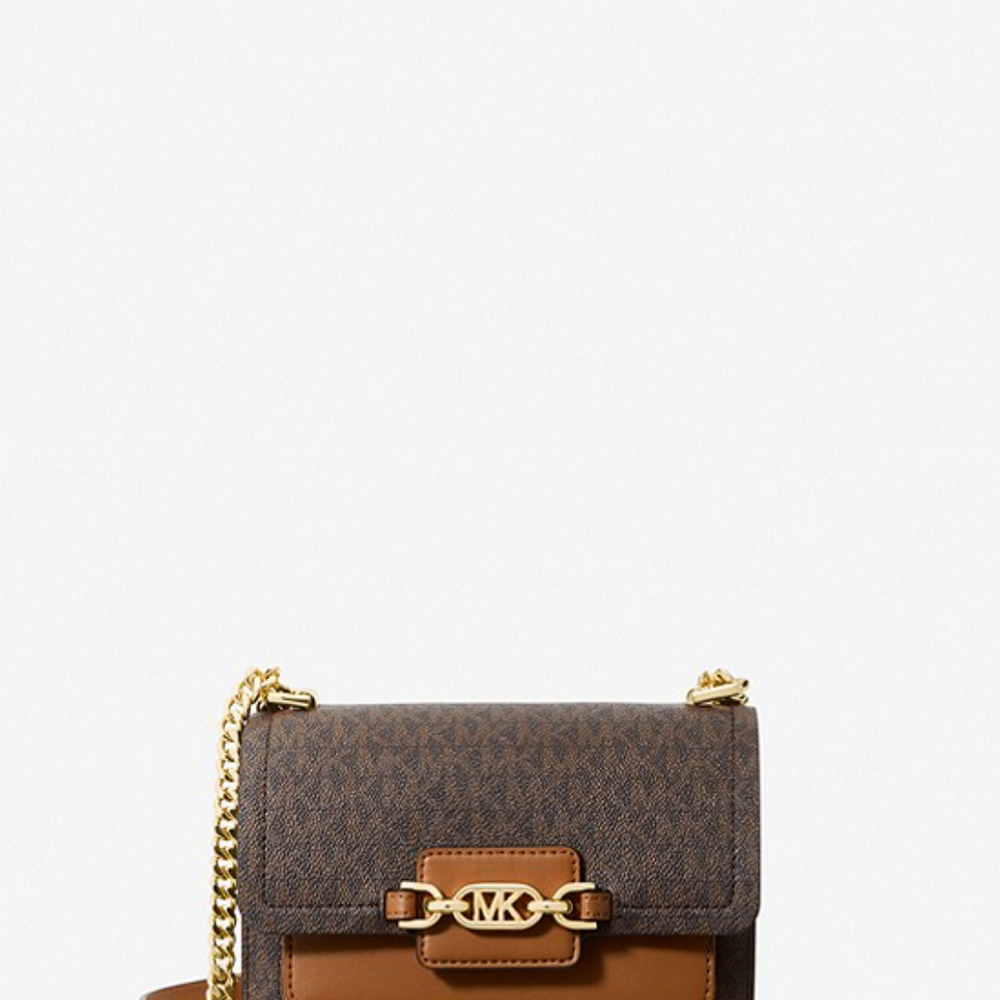 
                      
                        MICHAEL KORS Grand sac porté épaule Heather en cuir
                      
                    