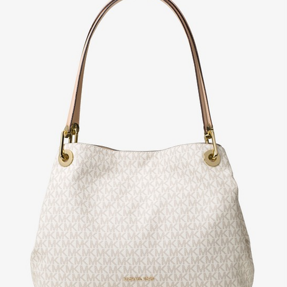 
                      
                        MICHAEL KORS Grand sac porté épaule Raven en cuir Camel
                      
                    